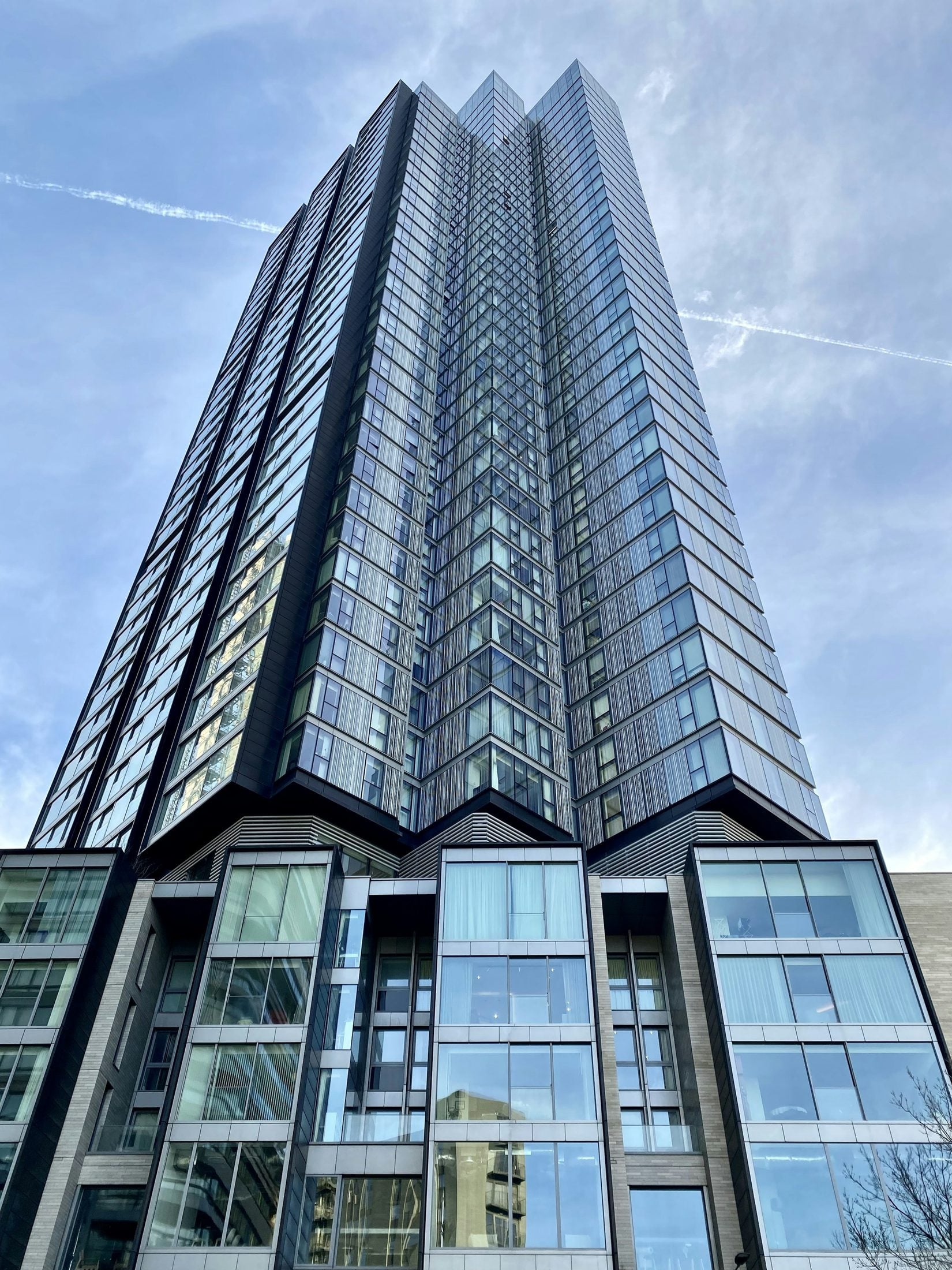 Demo image. Glass tower seen from below.